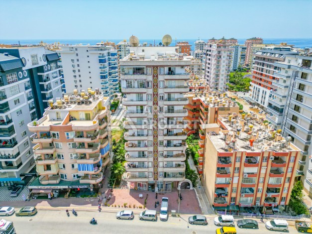 Светлая квартира 3+1 с видом на море в центре Махмутлара, 140 м² - Ракурс 0