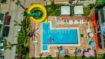 Светлая квартира 3+1 с видом на море в центре Махмутлара, 140 м² - Ракурс 2