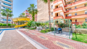 Светлая квартира 3+1 с видом на море в центре Махмутлара, 140 м² - Ракурс 4