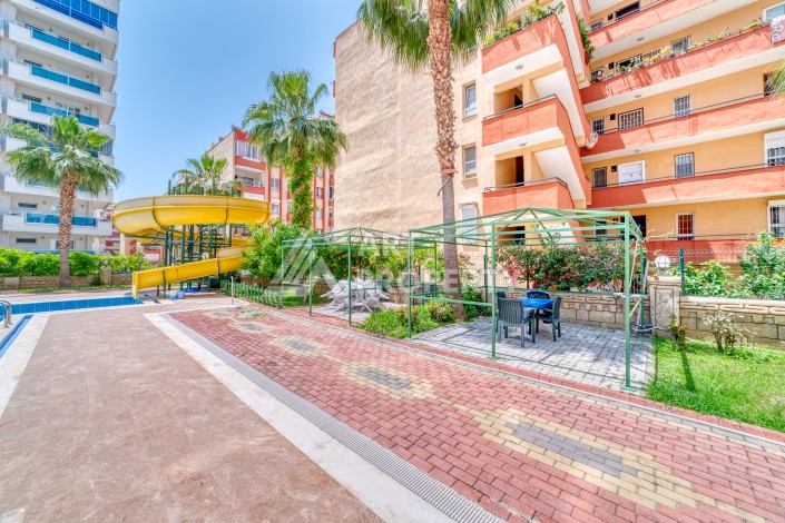 Светлая квартира 3+1 с видом на море в центре Махмутлара, 140 м² - Ракурс 3