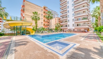 Светлая квартира 3+1 с видом на море в центре Махмутлара, 140 м² - Ракурс 5