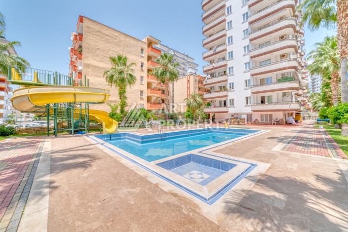 Светлая квартира 3+1 с видом на море в центре Махмутлара, 140 м² - Ракурс 4