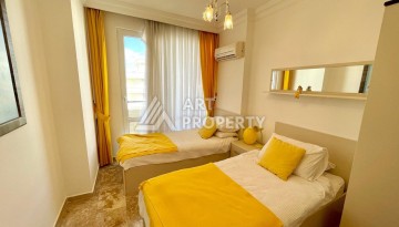 Светлая квартира 3+1 с видом на море в центре Махмутлара, 140 м² - Ракурс 17