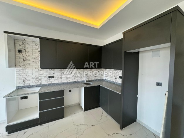 Двухуровневая квартира 2+1 в центре Махмутлара — 125 м² - Ракурс 11