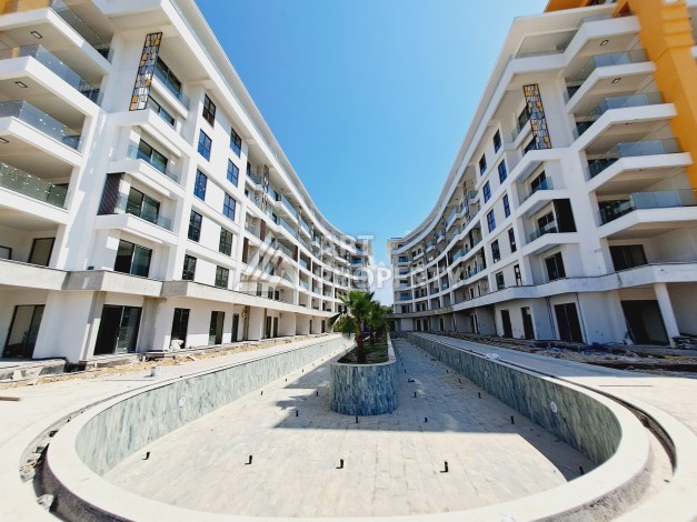 Большая квартира 2+1 XL в премиальном комплексе района Тюрклер. До моря 300 метров - Ракурс 34