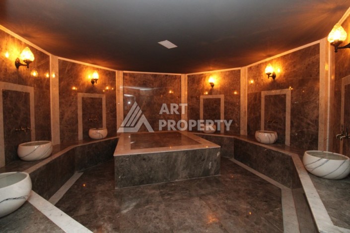 Квартира 2+1 в новом доме, 200 м до моря, в центре Махмутлара - Ракурс 7