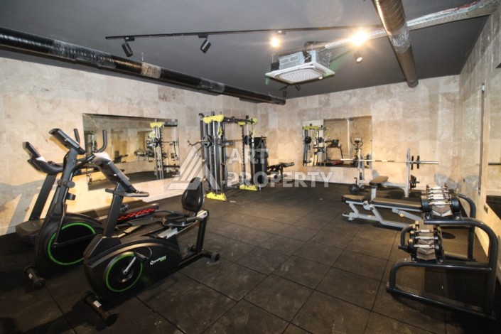 Квартира 2+1 в новом доме, 200 м до моря, в центре Махмутлара - Ракурс 10