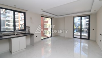 Квартира 2+1 в новом доме, 200 м до моря, в центре Махмутлара - Ракурс 15