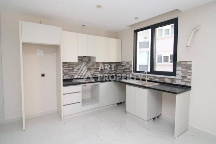 Квартира 2+1 в новом доме, 200 м до моря, в центре Махмутлара - Ракурс 15