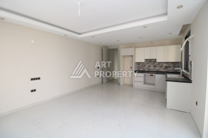 Квартира 2+1 в новом доме, 200 м до моря, в центре Махмутлара - Ракурс 17