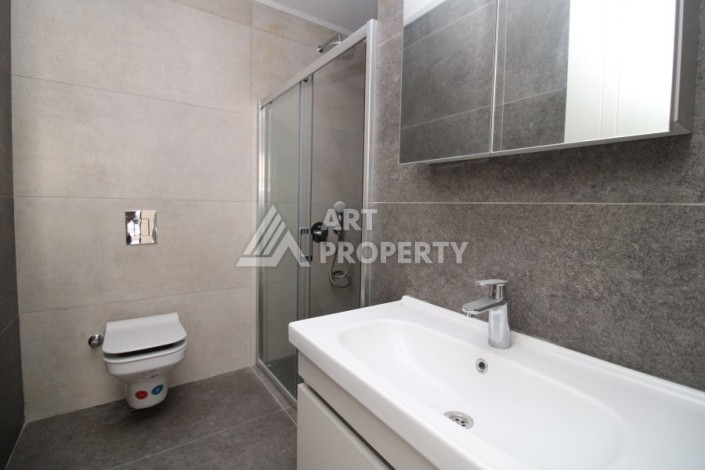 Квартира 2+1 в новом доме, 200 м до моря, в центре Махмутлара - Ракурс 23