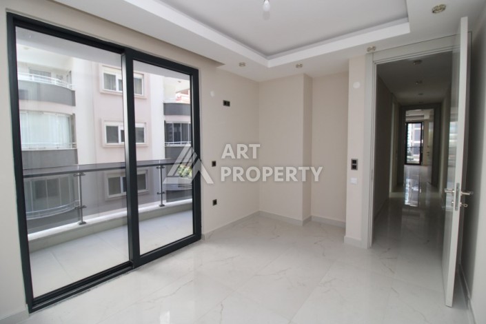 Квартира 2+1 в новом доме, 200 м до моря, в центре Махмутлара - Ракурс 24