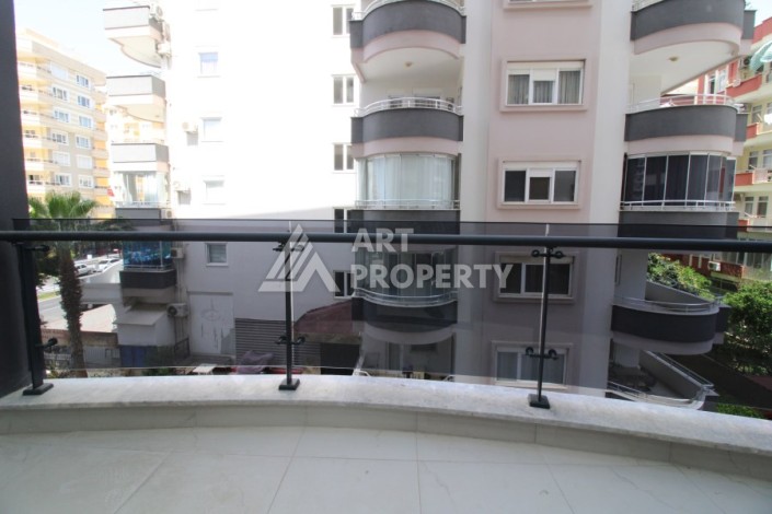 Квартира 2+1 в новом доме, 200 м до моря, в центре Махмутлара - Ракурс 26