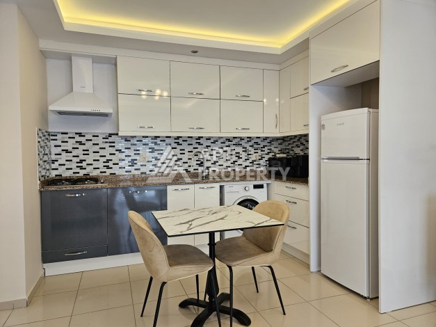 Меблированная квартира 1+1 с южной ориентацией и локацией у моря. Обагёль, Алания - Ракурс 4