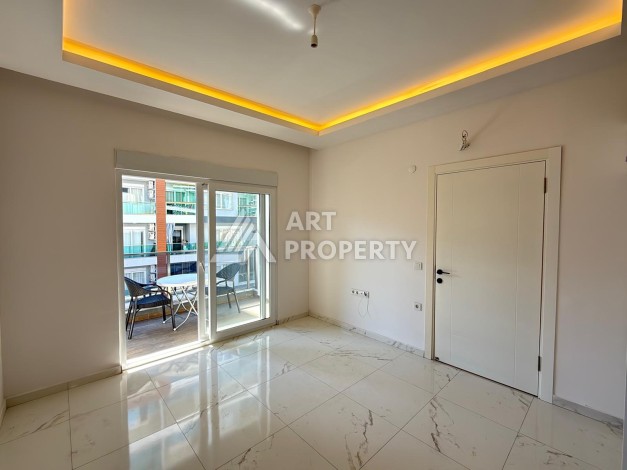 Квартира 1+1 в 500 метрах от моря в Махмутларе, 48 кв.м. - Ракурс 7