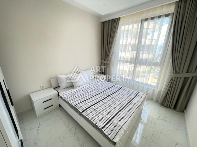 Меблированная квартира 1+1 в новом доме с видом на природу, 56 кв.м. Махмутлар, Алания - Ракурс 10