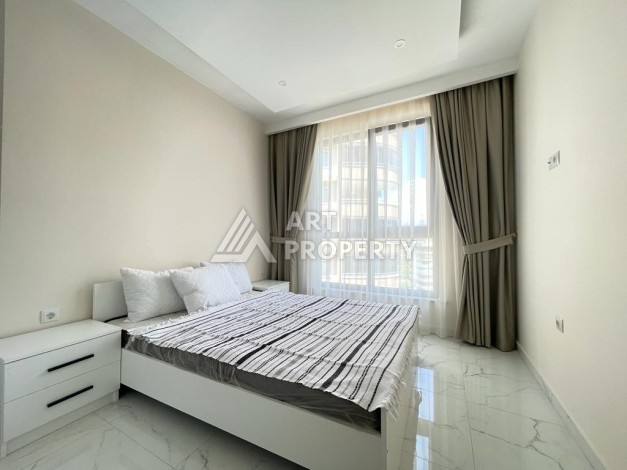 Меблированная квартира 1+1 в новом доме с видом на природу, 56 кв.м. Махмутлар, Алания - Ракурс 17