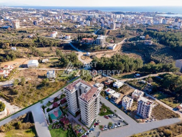 Квартира 1+1 с видом на бассейн в окружении сосен, 59 кв.м. Авсаллар, Алания - Ракурс 2