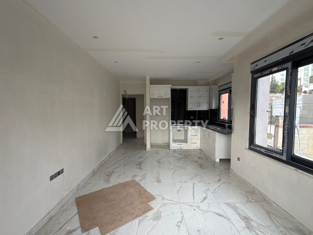 Квартира 1+1 с видом на бассейн в окружении сосен, 59 кв.м. Авсаллар, Алания - Ракурс 5