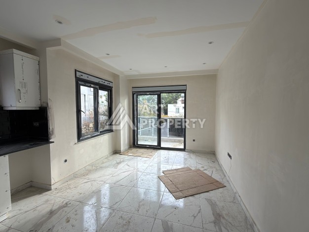 Квартира 1+1 с видом на бассейн в окружении сосен, 59 кв.м. Авсаллар, Алания - Ракурс 6