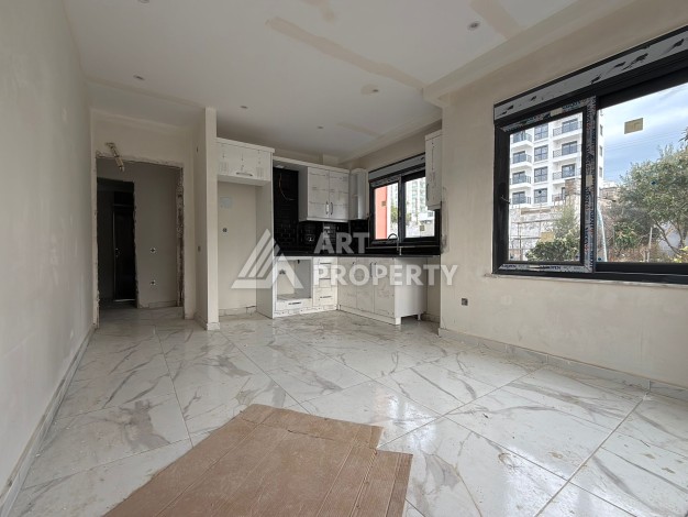 Квартира 1+1 с видом на бассейн в окружении сосен, 59 кв.м. Авсаллар, Алания - Ракурс 8