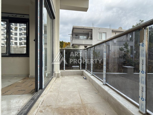 Квартира 1+1 с видом на бассейн в окружении сосен, 59 кв.м. Авсаллар, Алания - Ракурс 9