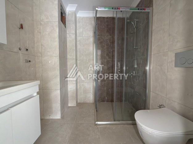 Квартира 1+1 с видом на бассейн в окружении сосен, 59 кв.м. Авсаллар, Алания - Ракурс 11