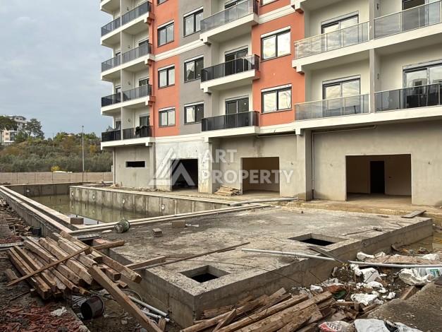 Квартира 1+1 с видом на бассейн в окружении сосен, 59 кв.м. Авсаллар, Алания - Ракурс 22