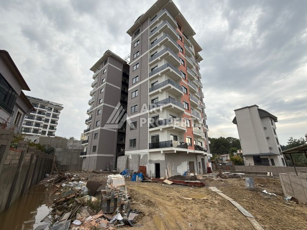 Квартира 1+1 с видом на бассейн в окружении сосен, 59 кв.м. Авсаллар, Алания - Ракурс 23