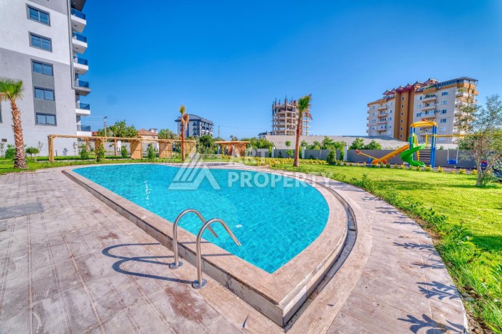 Квартира 1+1 с дизайнерский интерьером в Авсалларе, 55 кв.м. - Ракурс 4