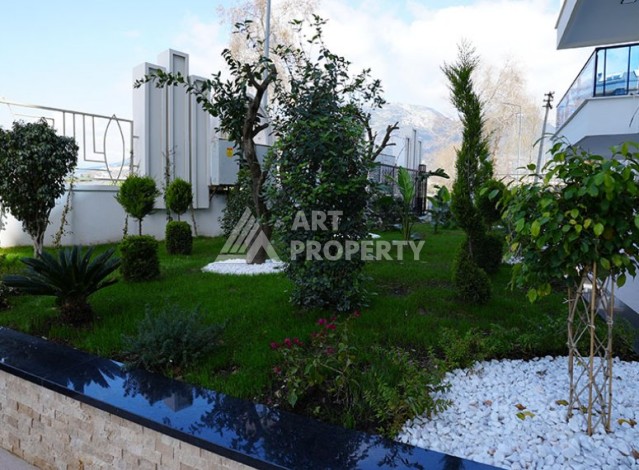 Двухкомнатная квартира 54 кв.м. в элитной резиденции. Центр района Махмутлар. - Ракурс 5