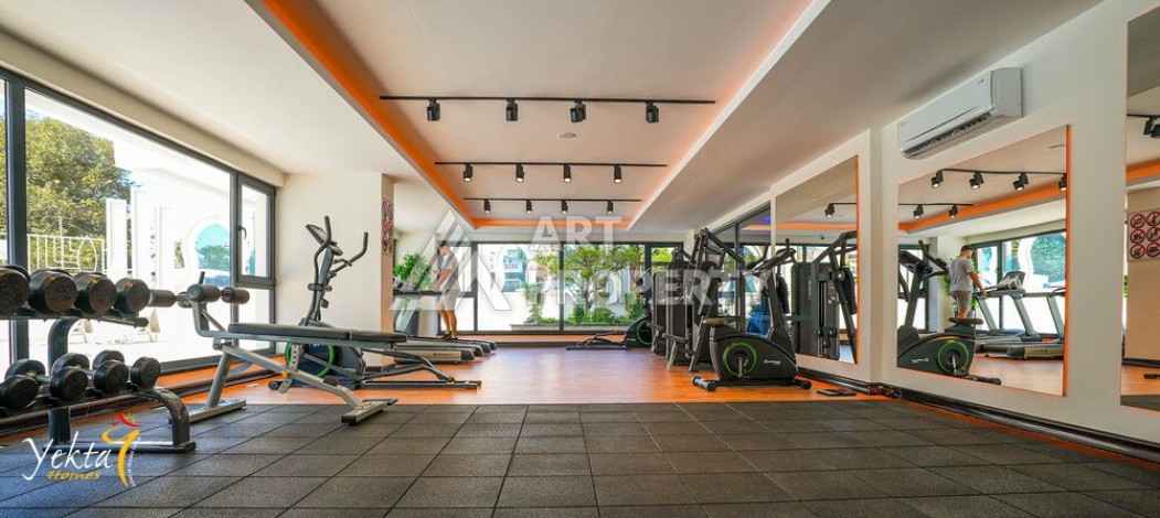 Двухкомнатная квартира 54 кв.м. в элитной резиденции. Центр района Махмутлар. - Ракурс 8