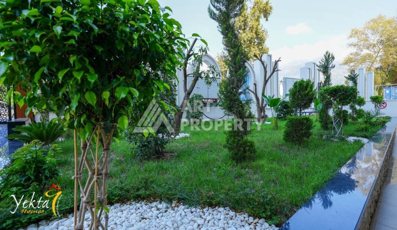 Двухкомнатная квартира 54 кв.м. в элитной резиденции. Центр района Махмутлар. - Ракурс 10