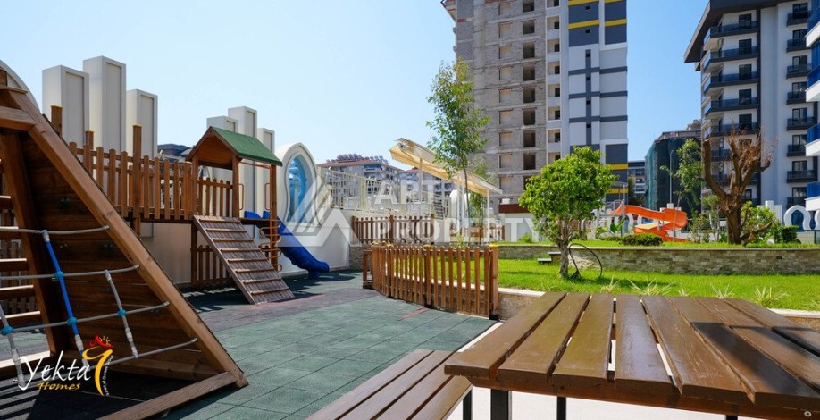 Двухкомнатная квартира 54 кв.м. в элитной резиденции. Центр района Махмутлар. - Ракурс 14