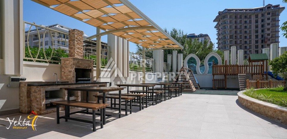 Двухкомнатная квартира 54 кв.м. в элитной резиденции. Центр района Махмутлар. - Ракурс 18