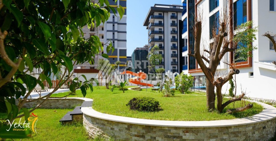 Двухкомнатная квартира 54 кв.м. в элитной резиденции. Центр района Махмутлар. - Ракурс 19