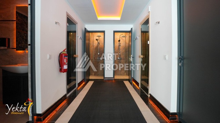 Двухкомнатная квартира 54 кв.м. в элитной резиденции. Центр района Махмутлар. - Ракурс 23