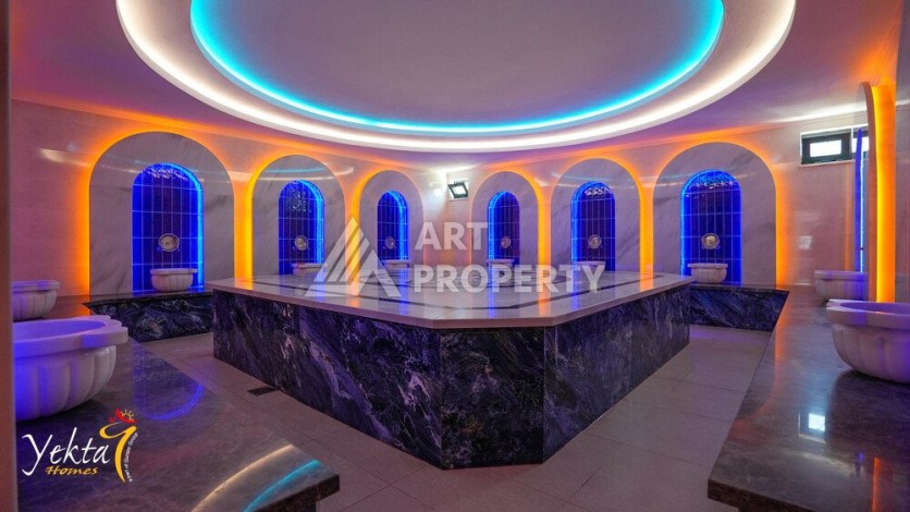 Двухкомнатная квартира 54 кв.м. в элитной резиденции. Центр района Махмутлар. - Ракурс 27