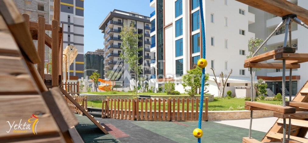 Двухкомнатная квартира 54 кв.м. в элитной резиденции. Центр района Махмутлар. - Ракурс 31