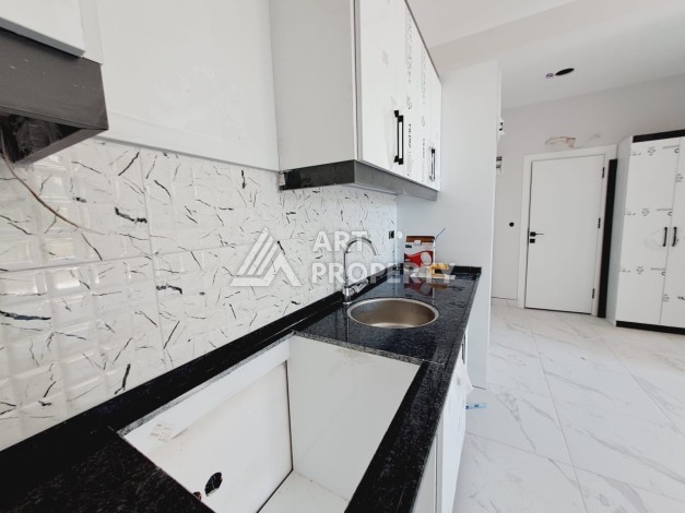 Квартира 1+1 с видом на бассейн в районе Авсаллар, 55 кв.м. - Ракурс 13