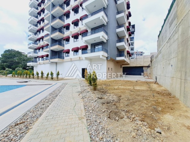 Квартира 1+1 с видом на бассейн в районе Авсаллар, 55 кв.м. - Ракурс 20