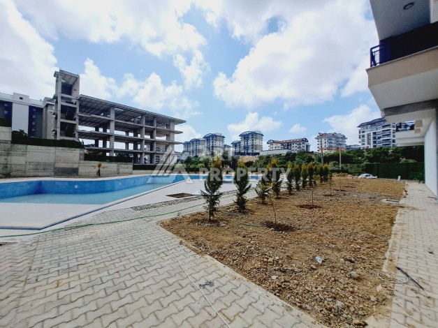 Квартира 1+1 с видом на бассейн в районе Авсаллар, 55 кв.м. - Ракурс 24