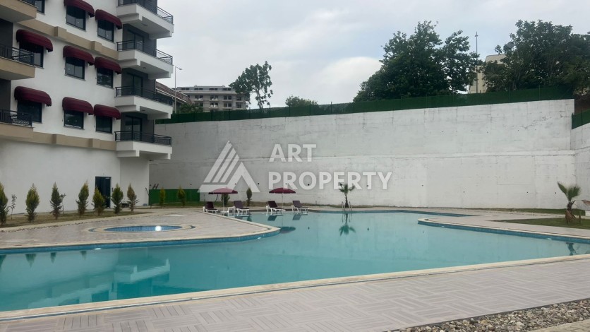 Квартира 1+1 с видом на бассейн в районе Авсаллар, 55 кв.м. - Ракурс 4