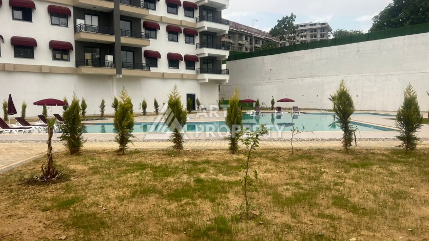 Квартира 1+1 с видом на бассейн в районе Авсаллар, 55 кв.м. - Ракурс 5