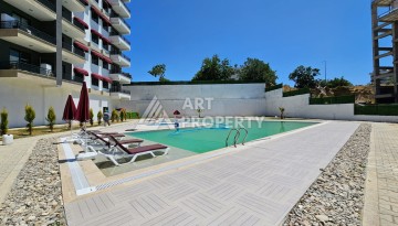 Южная квартира 1+1 в центре Авсаллара, новая резиденция, 55 кв.м. - Ракурс 2