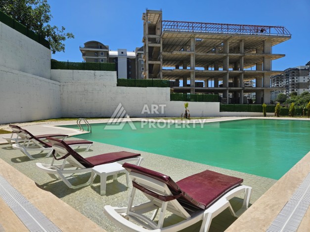 Южная квартира 1+1 в центре Авсаллара, новая резиденция, 55 кв.м. - Ракурс 2