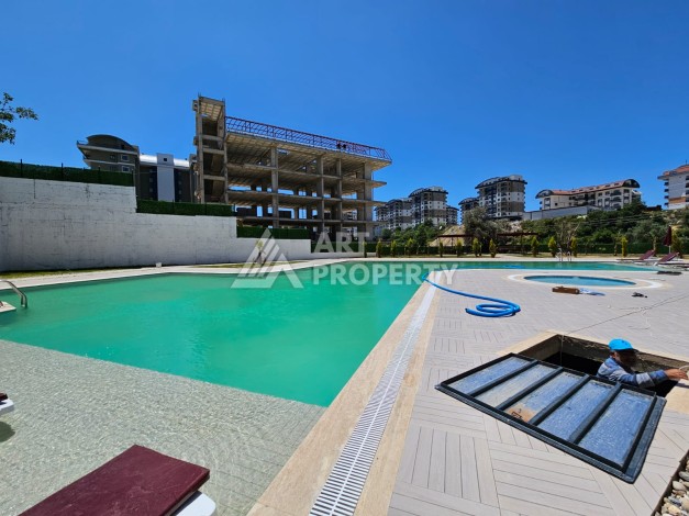 Южная квартира 1+1 в центре Авсаллара, новая резиденция, 55 кв.м. - Ракурс 3