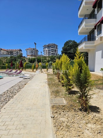 Южная квартира 1+1 в центре Авсаллара, новая резиденция, 55 кв.м. - Ракурс 4