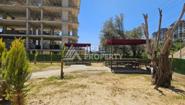 Южная квартира 1+1 в центре Авсаллара, новая резиденция, 55 кв.м. - Ракурс 6