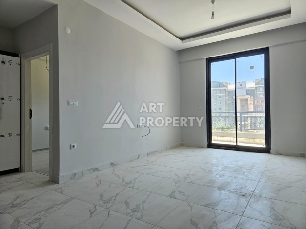 Южная квартира 1+1 в центре Авсаллара, новая резиденция, 55 кв.м. - Ракурс 6